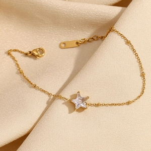 18K gold plated stainless steel star bracelet with micro-pave crystals on silk