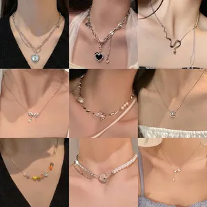 Elegant pearl necklaces collection with heart and butterfly pendants on models