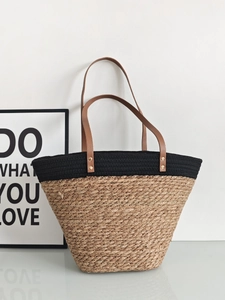Large straw tote bag with black fabric splice and brown PU leather straps for beach holidays