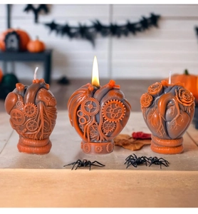 Detailed steampunk mechanical heart candle with gear structures and rose carvings
