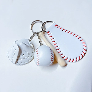 Detail of 4-piece baseball keychain with mini glove, ball, wooden bat and leather tag
