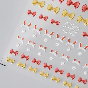 Autocollants nail art 3D avec nœuds rouges et oreilles de lapin blanches
