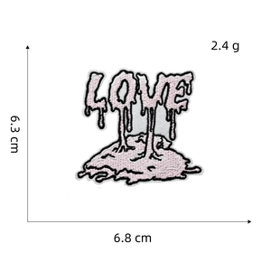 Detailed view of melting LOVE heart embroidery patch showing 6.3cm x 6.8cm size and 2.4g weight