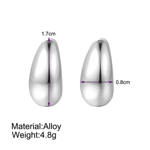 Macro detail of teardrop alloy earrings in silver finish showing size and weight specs
