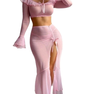 Pink sheer mesh two-piece set featuring ruffle off-shoulder top and long slit skirt