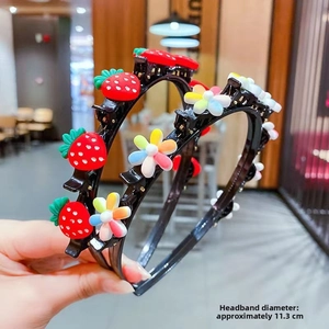 Detail view of cartoon hair hoop with strawberry and flower clips, 11.3cm diameter