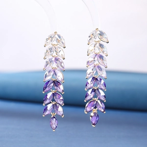 Elegant gold drop earrings with gradient purple cubic zirconia in leaf design