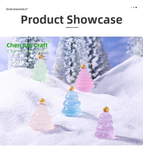 Miniature resin Christmas trees in pastel colors on a snow-themed DIY holiday landscape