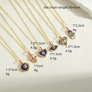 Golden Evil Eye necklaces featuring heart and palm pendants with colorful drip oil and crystals
