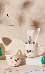Gobelet de brossage de dents haut de gamme style crème avec motif cartoon pour enfants