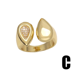 Vintage gold teardrop open ring with bow design and sparkling pavé cubic zirconia