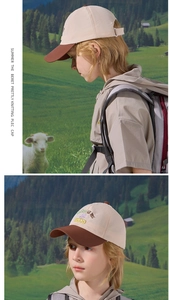 Detail of color-block kids baseball cap with GOOD embroidery and adjustable strap