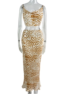 Detail of pleated fabric texture on tropical leaf print two-piece summer set for women
