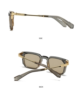 Detail view of vintage square sunglasses featuring translucent frames and gold metal temples