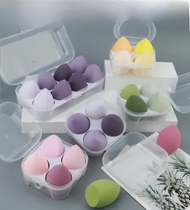 Detail view of multi-colored teardrop makeup sponges set in clear storage box