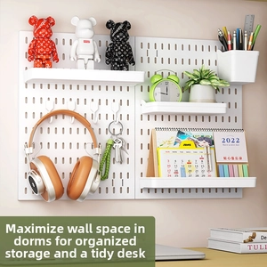 Wall-mounted white pegboard organizer set with shelves, hooks and storage bins