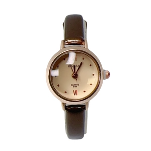 Elegant ladies small gold dial quartz watch with a classic dark brown leather strap