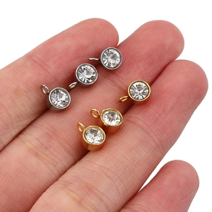Polished stainless steel rhinestone earring studs with hanging loops in gold and silver