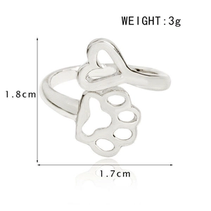 Detailed view of silver hollow heart and dog paw ring showing 1.8cm size measurements