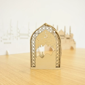Macro detail of wooden Eid ornament featuring laser-cut mosque and crescent moon design