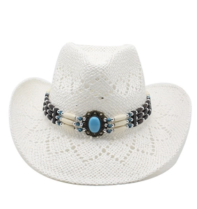 Detailed view of white hollow woven cowboy hat with ethnic beaded band and turquoise stone