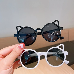 Kids' cat ear sunglasses in black and white with round lenses and stylish plastic frames
