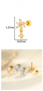 Macro shot of diamond-studded rhombus ear piercing studs with dimensions 1.27cm height