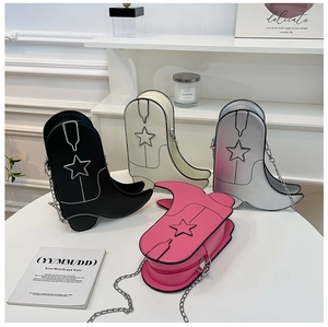Close-up of creative cowboy boot shaped mini bags in black, white, silver and pink colors