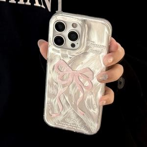 Close-up of ballet dancer and pink bow relief pattern on iPhone case with glossy finish