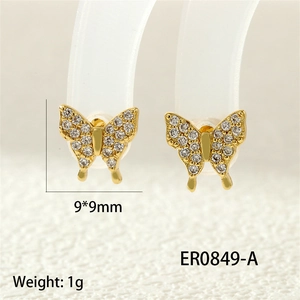 Detailed close-up of gold butterfly stud earring with dimensions 9x9mm and white zircons