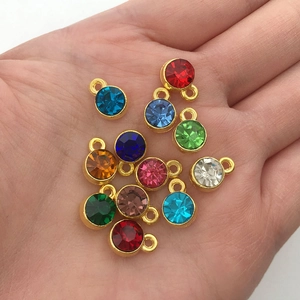 Set of 12 colorful crystal birthstone pendants with gold metal frames for DIY jewelry
