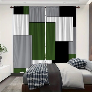 Close-up of geometric color block curtains in dark green and grey with hanging grommets