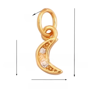 Detailed view of a gold crescent moon pendant with inlaid white zircon stones and dimensions