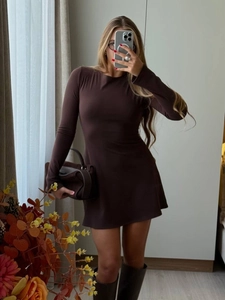 Detail of dark brown long-sleeve knit mini dress with slim-fit bodycon silhouette