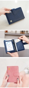 Internal layout of travel passport wallet showing SIM slots and multiple card holders