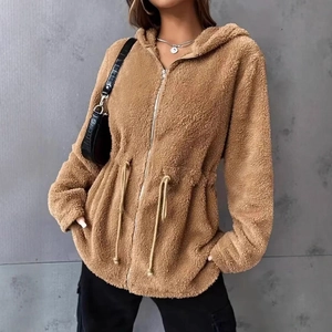 Detail of camel teddy fleece hooded jacket featuring waist drawstring and metal zipper