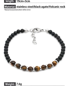 Detail view of tiger eye and black onyx beads with stainless steel clasp and chain