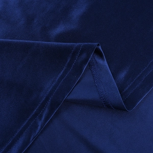 Close-up of deep blue satin fabric showing silky texture and double-needle stitching detail