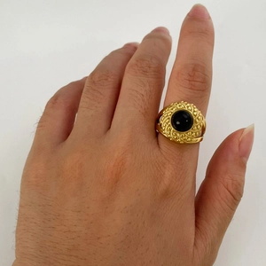 Retro 18K gold plated stainless steel ring with black natural stone inlay on finger
