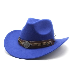 Detail of royal blue wool cowboy hat featuring star rivets on a brown leather band