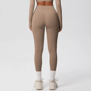 Rear view of high waisted coffee brown yoga leggings showing the seamless fit and fabric texture