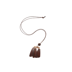 Vintage resin wood pendant necklace with brown tassels and bohemian style elements