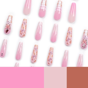 Extra long pink coffin press-on nails set with butterfly charms and glitter details
