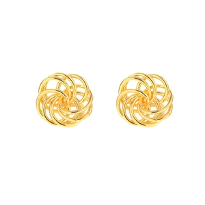 Detailed view of hollow 18K gold-plated bird nest style hoop earrings in a spiral design