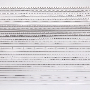Various S925 sterling silver chain necklaces including box and snake styles on white