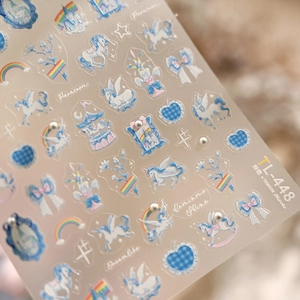 Blue and white unicorn rainbow nail art stickers with embossed dreamlike patterns