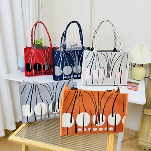 Knitted tote bags with polka dot and geometric patterns in red, navy, cream, and orange colors