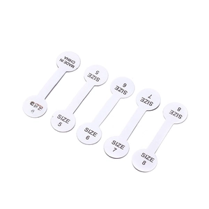 Self-adhesive white dumbbell jewelry tags showing sizes 5 to 8 for price labeling