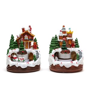 Christmas gingerbread candy house and castle rotating music box with festive decorations