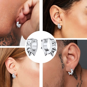 Macro view of silver stainless steel spike stud earrings with matching model lifestyle shots